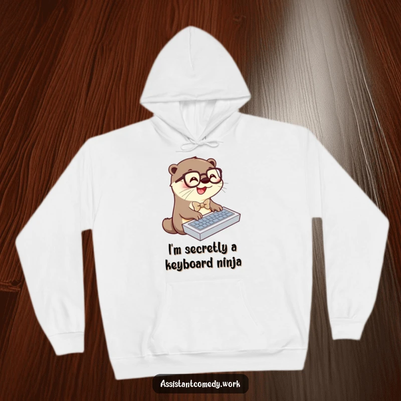 A cheerful otter in a bowtie and glasses typing on a keyboard, featured on a warm, comfortable hoodie, ready for screen readers.